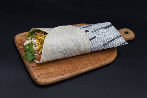 studio photo of a healthy wrapped sandwich - junk food stock pictures, royalty-free photos & images