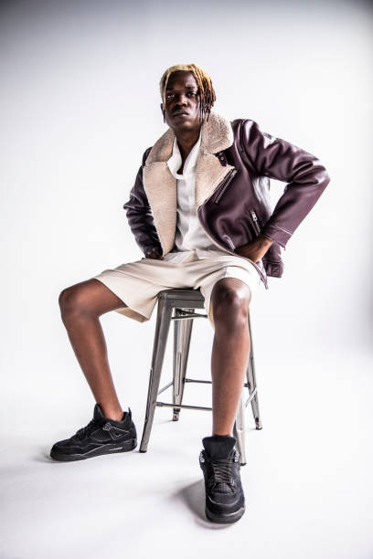 studio portrait of fashionable young man - fashion stock pictures, royalty-free photos & images