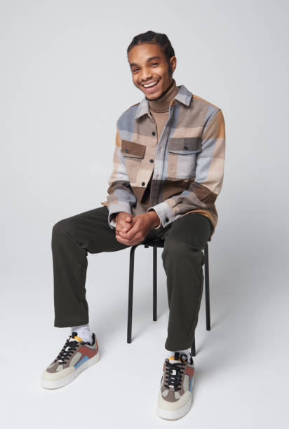 studio portrait of young fashionable man - fashion stock pictures, royalty-free photos & images