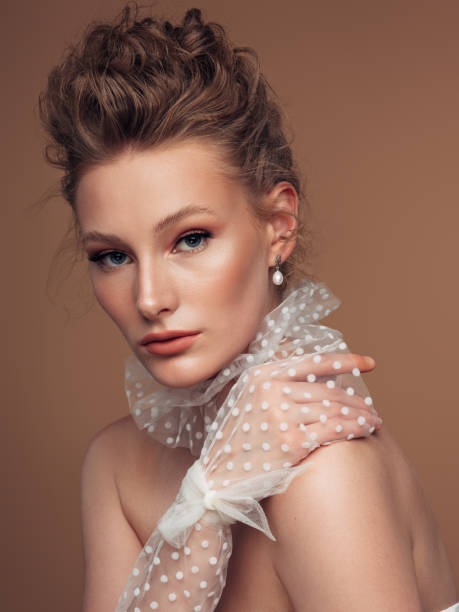 studio shot of a beautiful blond woman - hairstyle stock pictures, royalty-free photos & images