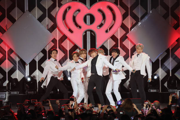 Suga, Jin, Jungkook, RM, Jimin, and J-Hope of BTS performs during the iHeartRadio KIIS FM's Jingle Ball show at the Forum on December 06, 2019 in...