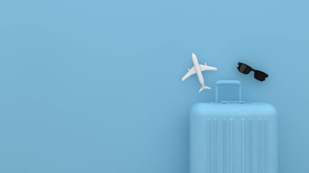 suitcase, minimal travel concept with blue background - travel stock pictures, royalty-free photos & images