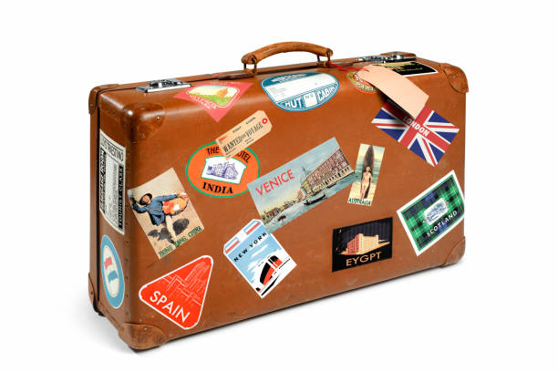 suitcase with travel stickers - travel stock pictures, royalty-free photos & images