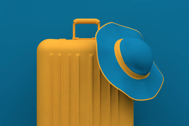 summer travel concept, hat and suitcase on blue background - travel stock pictures, royalty-free photos & images