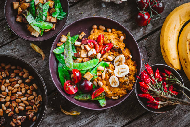 sweet potato banana curry with peanut butter - food stock pictures, royalty-free photos & images