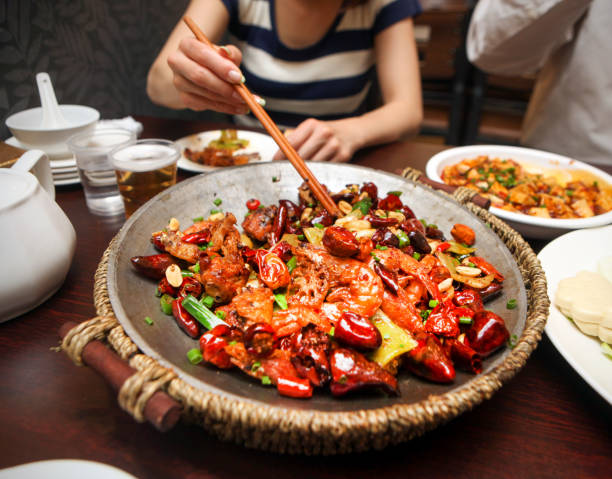 szechwan dry hotpot with chicken wing and prawn - food stock pictures, royalty-free photos & images