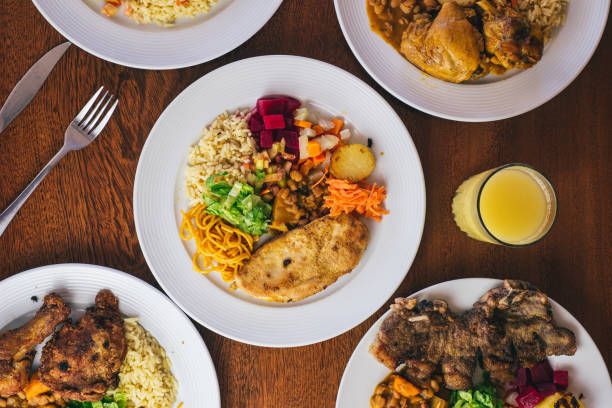table full of food for family top view - food stock pictures, royalty-free photos & images