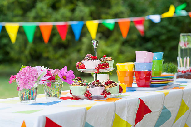 table in garden on a birthday party - garden decoration stock pictures, royalty-free photos & images