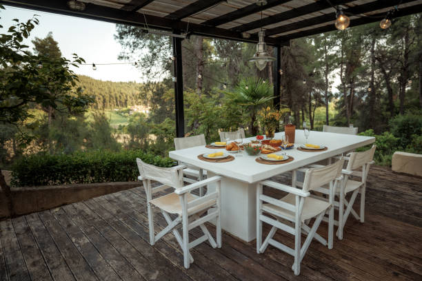 table ready for dinner party in back yard with no people - garden decoration stock pictures, royalty-free photos & images