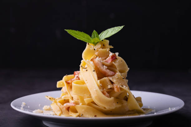 tagliatelle carbonara dish - food stock pictures, royalty-free photos & images