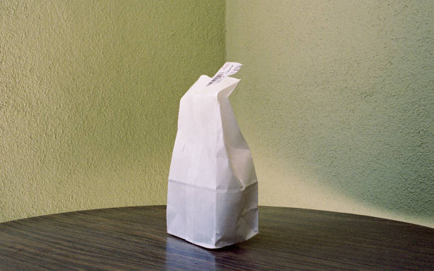 take out bag on table - junk food stock pictures, royalty-free photos & images