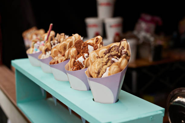 take out food on display at concession stand - concert stock pictures, royalty-free photos & images