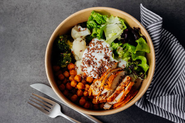 take out food. vegan falafel bowl in disposable eco-friendly packaging. high angle view, flat lay. concept of healthy meal. - junk food stock pictures, royalty-free photos & images