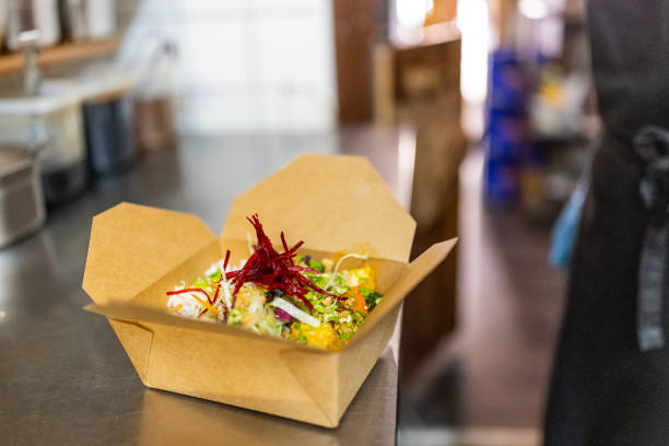 takeaway asian food order ready in restaurant kitchen - junk food stock pictures, royalty-free photos & images