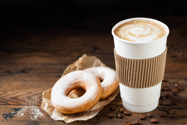 takeaway coffee cup and donuts - junk food stock pictures, royalty-free photos & images