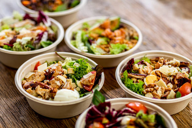 takeaway food ready to eat on a table - junk food stock pictures, royalty-free photos & images