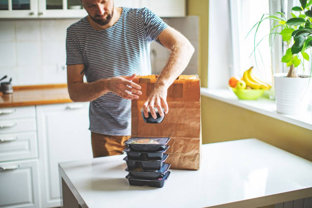 takeaway meals at home during quarantine - junk food stock pictures, royalty-free photos & images
