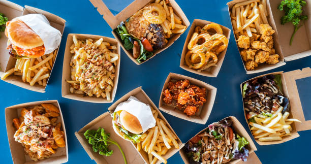 takeout food background. - junk food stock pictures, royalty-free photos & images
