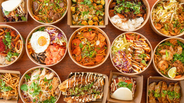 takeout food in biodegradable boxes. - junk food stock pictures, royalty-free photos & images