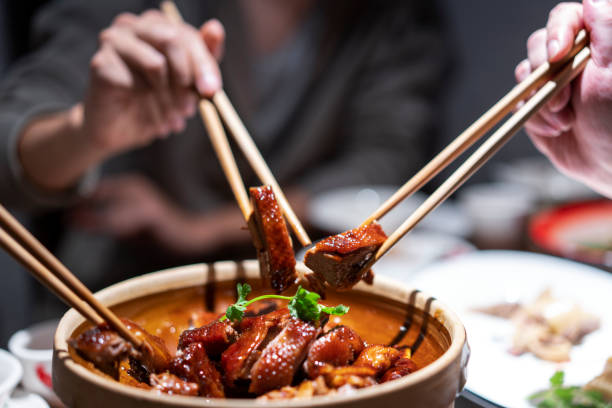 tasting hong kong cuisine - food stock pictures, royalty-free photos & images