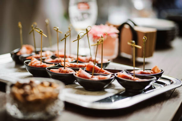 tasty bites stock photo. catering food in a bar - food stock pictures, royalty-free photos & images