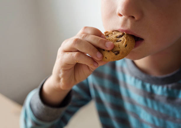 tasty cookie - junk food stock pictures, royalty-free photos & images
