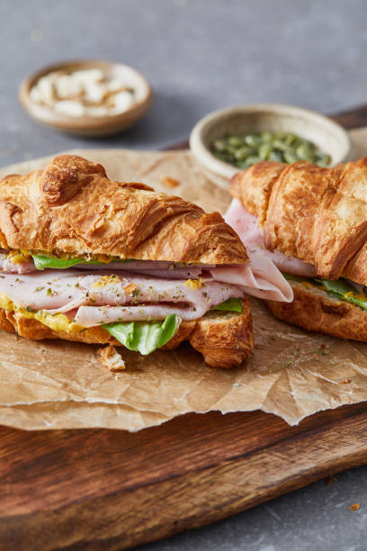 tasty croissant sandwich for breakfast - junk food stock pictures, royalty-free photos & images