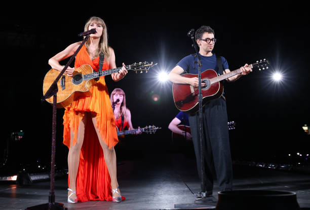 Taylor Swift and Jack Antonoff perform onstage during "Taylor Swift | The Eras Tour" at Wembley Stadium on August 20, 2024 in London, England.