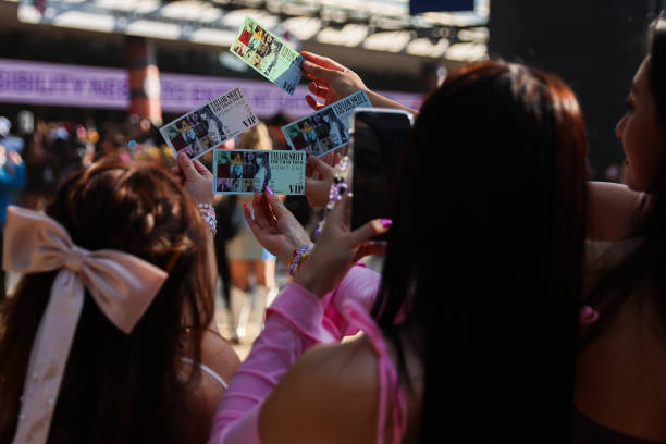 Taylor Swift fans, also known as "Swifties", hold up tickets purchased for the show at Melbourne Cricket Ground on February 16, 2024 in Melbourne,...