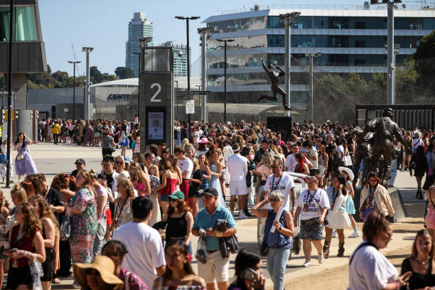 Taylor Swift fans, also known as "Swifties", throng the gates as they open for her "Taylor Swift | The Eras Tour" concert at Melbourne Cricket Ground...