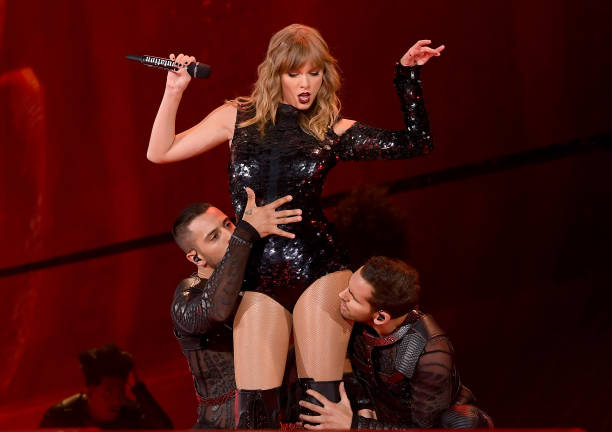 Taylor Swift, Swift performs onstage during opening night of her 2018 Reputation Stadium Tour at University of Phoenix Stadium on May 8, 2018 in...
