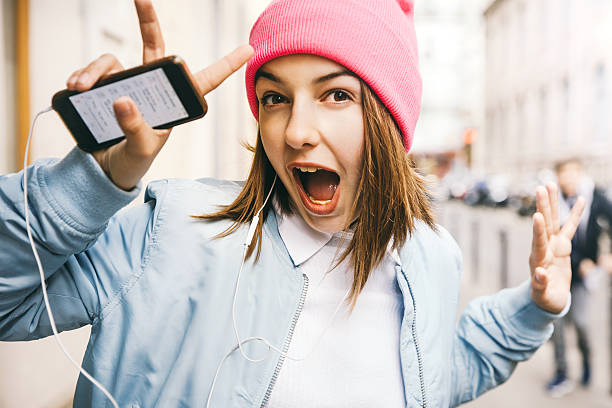 teenager girl listening music - fashion stock pictures, royalty-free photos & images