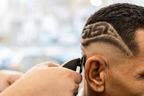 the artful barber - hairstyle stock pictures, royalty-free photos & images