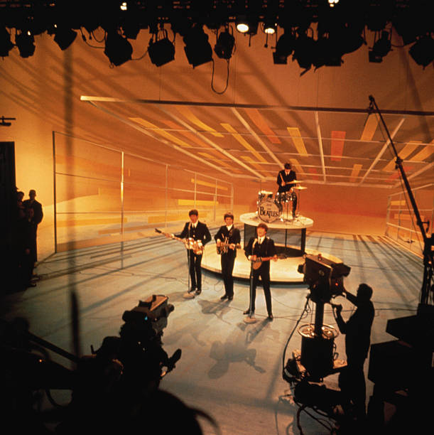 The Beatles performing during their nationwide television debut on The Ed Sullivan Show from CBS television studios in Manhattan.