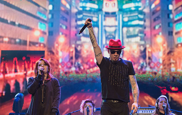 The Italian singers Noemi e J-Ax perfom live at The traditional Labor Day concert in Rome's central Piazza San Giovanni on Friday, 1st May 2015...