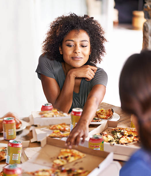 thinking about the next slice - junk food stock pictures, royalty-free photos & images