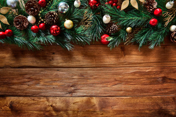 top view of christmas garland on rustic wooden table with copy space - home decoration stock pictures, royalty-free photos & images