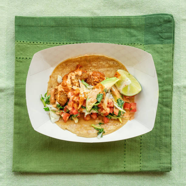 top view of one fish taco - junk food stock pictures, royalty-free photos & images
