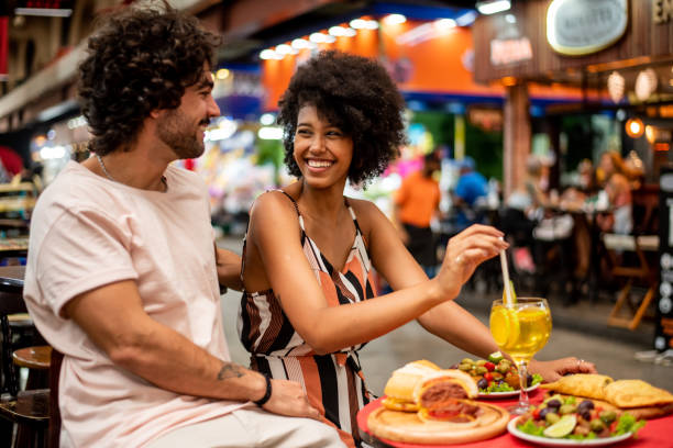 tourist couple at the market - food stock pictures, royalty-free photos & images