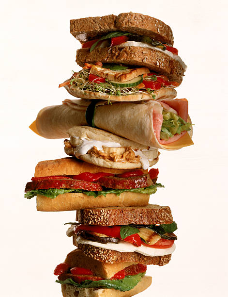 tower of sandwiches - junk food stockfoto's en -beelden