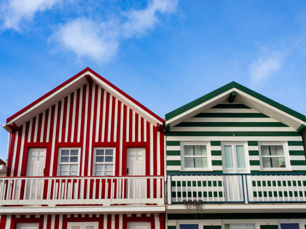 traditional colorful striped houses in costa nova, aveiro, portugal - garden decoration stock pictures, royalty-free photos & images