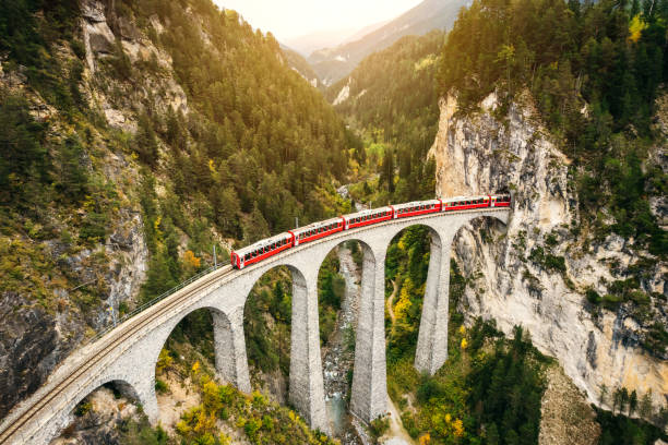 train crossing landwasser viaduct , switzerland - travel stock pictures, royalty-free photos & images