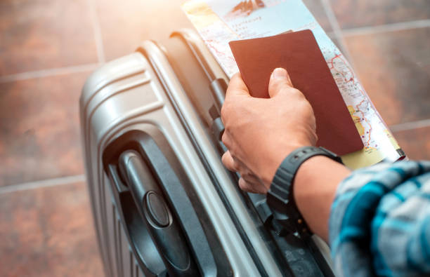 travel bags and passport flight travel traveller - travel stock pictures, royalty-free photos & images