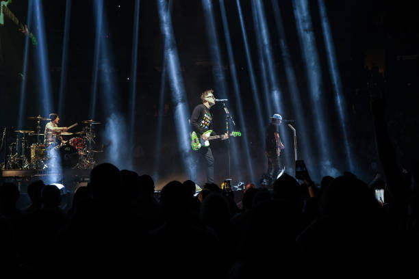 Travis Barker, Mark Hoppus and Tom DeLonge of Blink-182 perform onstage at Madison Square Garden on May 19, 2023 in New York City.
