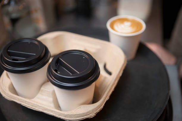 tray of coffee in disposable cups in cafe - junk food stock pictures, royalty-free photos & images