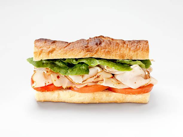 turkey sandwich on a baguette - junk food stock pictures, royalty-free photos & images