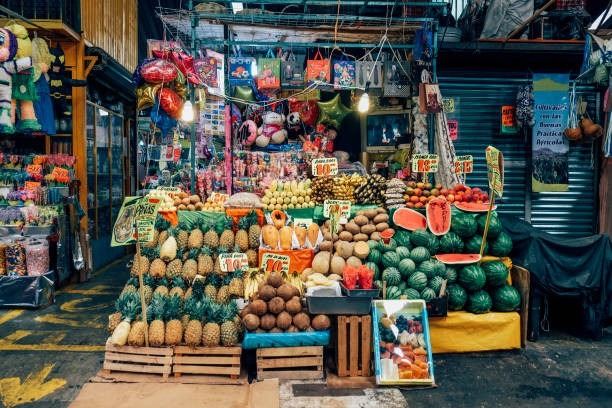 two females shopping together in market - food stock pictures, royalty-free photos & images