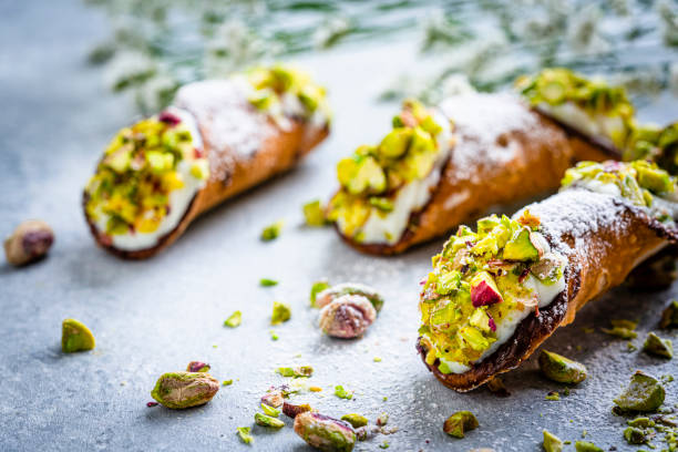 typical italian dessert cannoli from sicily - food stock pictures, royalty-free photos & images