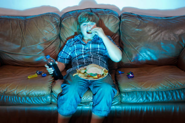 unhealthy eating - junk food stock pictures, royalty-free photos & images