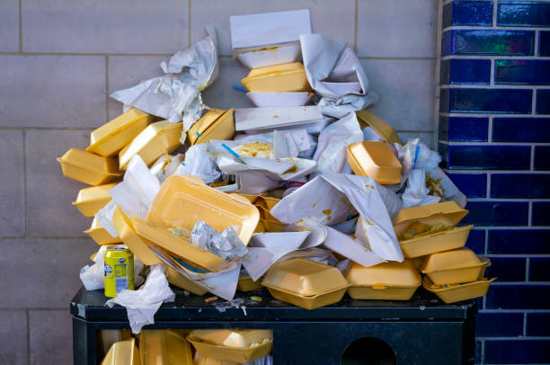 Used polystyrene takeaway food cartons are piled on a bin on May 20, 2023 in Cardiff, Wales.